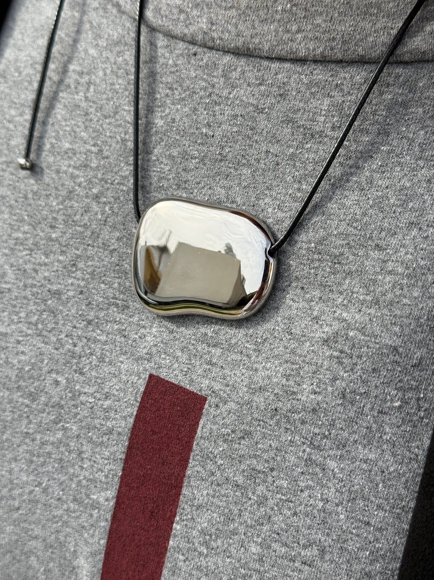 Long Stainless Steel Necklace on Black Leather Cord